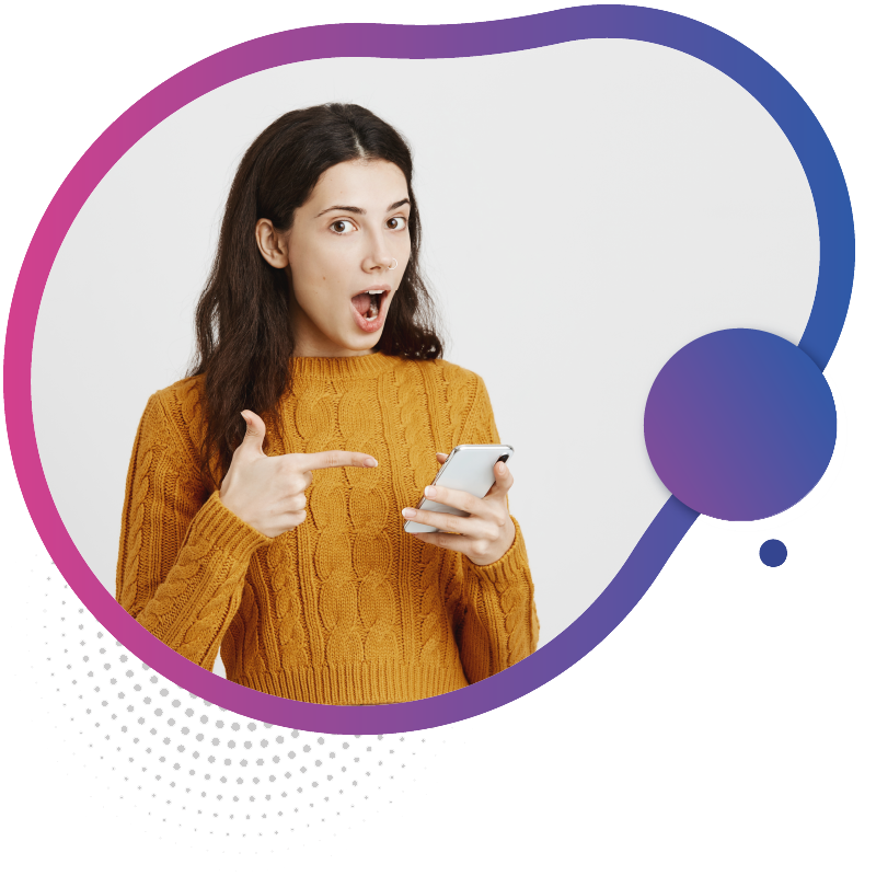 A woman in a cozy yellow sweater holding a smartphone and pointing with her left hand, symbolizing the future-proof eSIM choice for seamless connectivity in Australia.
